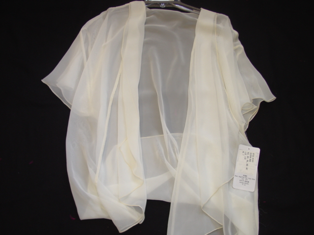 A WOVEN CHIFFON DRESSING GOWN STYLE ROBE FOR WOMEN.  REACHING DOWN TO MID THIGH.  COMPLETE FRONT OPENING WITHOUT FASTENING.  WITH DRAPEY LAPELS DOWN FRONT OPENING.  WITH SHORT SLEEVES.  OVERSEWN AT ALL EDGES.  OF POLYESTER. PACKED ON PLASTIC HANGER