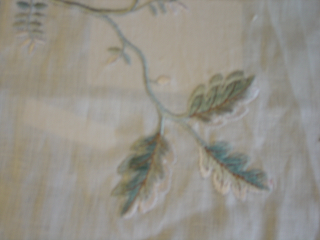 A WOVEN FABRIC WITH EMBROIDERED FLORAL DESIGN. OF 68 PERCENT LINEN AND 32 PERCENT VISCOSE. WITH VISIBLE BACKGROUND. PLAIN WEAVE. OF A VALUE EXCEEDING 17.50 EURO PER KG. WIDTH 157CMS. NOT HAND-MADE.