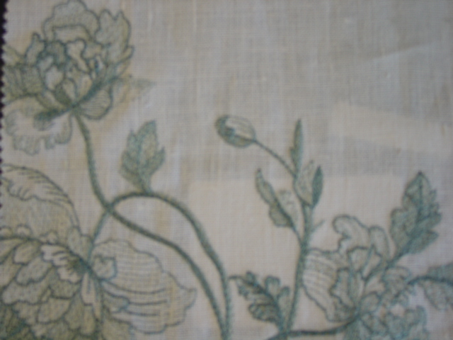 EMBORIDERED WOVEN FABRIC. WITH VISIBLE GROUND. WITH MACHINE EMBROIDERED DESIGN IN FLOWERS AND LEAVES. GREEN ON NATURAL COLOURED GROUND FABRIC. WIDTH 126CM. DESIGN REPEAT 65CM. DRY CLEAN ONLY. OF 86 PER CENT LINEN 14 PER CENT VISCOSE. OF A VALUE EXCEEDING 17.5 EURO PER KG (NET WEIGHT).