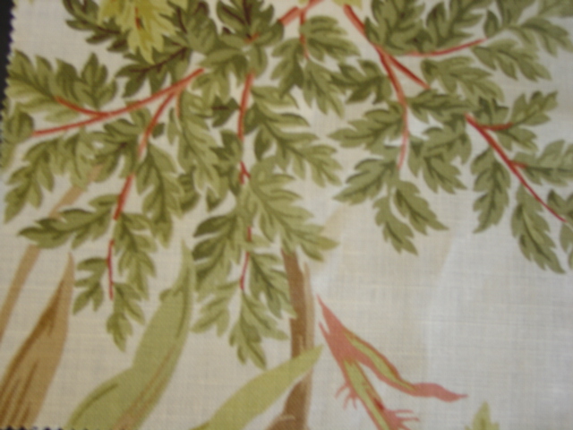 WOVEN FABRIC. WITH PRINTED SURFACE FORMING FLORAL LEAF SHAPED PATTERN. OF A WIDTH 145CM WEIGHING 225G PER SQUARE METRE. FABRIC IS MADE FROM 88 PERCENT LINEN 12 PERCENT NYLON.