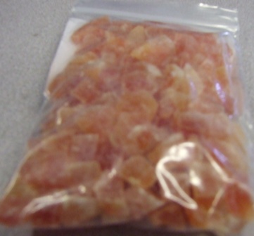 SMALL PIECES OF DICED PAPAYA THAT HAS BEEN DEHYDRATED AND HAS HAD SUGAR ADDED TO IT. PIECES NO LARGER THAN 1 CENTIMETER BY 1 CENTIMETER. THIS PRODUCT CAN BE ADDED TO BREAKFAST CEREALS. CONFIRMED WITH TRADER THAT IT COMES PACKAGED IN 20KG CARDBOARD CARTONS.