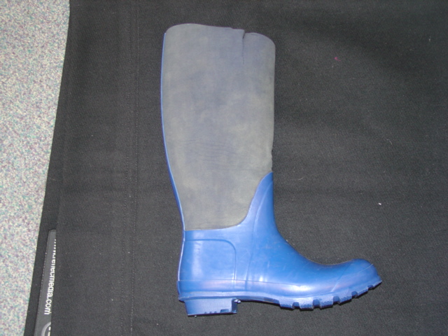 WOMENS WATERPROOF BOOT COVERING THE ANKLE BUT NOT COVERING THE KNEE. UPPERS MADE OF RUBBER AND NEOPRENE. SOLES MADE OF RUBBER.IN-SOLE LENGTH OF MORE THAN 24CMS. NEITHER FIXED TO THE SOLE NOR ASSEMBLED BY STITCHING, RIVETING, NAILING, SCREWING, PLUGGING OR SIMILAR PROCESSES.