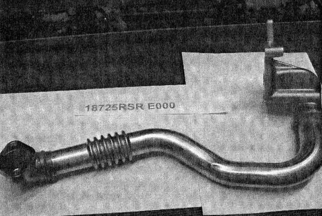 THE PART IS FOR USE IN THE INDUSTRIAL ASSEMBLY OF A COMPRESSION IGNITION (DIESEL) ENGINE OF A CYLINDER CAPACITY NOT EXCEEDING 2.500CM3. THESE ENGINES FALL UNDER TARIFF HEADING 8408, COMPRESSION IGNITION INTERNAL COMBUSTION PISTON ENGINES (DIESEL OR SEMI DIESEL ENGINES). THE PART AFFIXES TO THE ENGINE BETWEEN THE EXHAUST MANIFOLD AND THE INLET MANIFOLD. the part is a curved steel pipe with a concertina section to the middle portion of the pipe with cast aluminium fittings to each end of the pipe.THE PART IS DESIGNED  TO DIVERT EXHAUST GASES FROM THE ENGINE EXHAUST AND TO RE CIRCULATE GASES BACK TO THE INLET MANIFOLD  OF THE INTERNAL COMBUSTION ENGINE AND THE ENGINE CYLINDERS. THE CONCERTINA AREA OF THE PIPE RESULTS IN AN INCREASED SURFACE AREA FOR THIS SECTION OF THE PIPE TO HELP COOL THE EXHAUST GASES BEFORE RECIRCULATION TO THE CYLINDERS. EXHAUST AS RECIRCULATION (EGR) REDUCES NITROGEN OXIDE EMISSIONS BY REDUCING THE AMOUNT OF EXCESS OXYGEN ENTERING THE CYLINDERS AND REPLACING THIS WITH INERT EXHAUST GASES. EGR ALSO LOWERS THE TEMPERATURE OF COMBUSTION WHICH FURTHER REDUCES NITROGEN OXIDE EMISSIONS.
