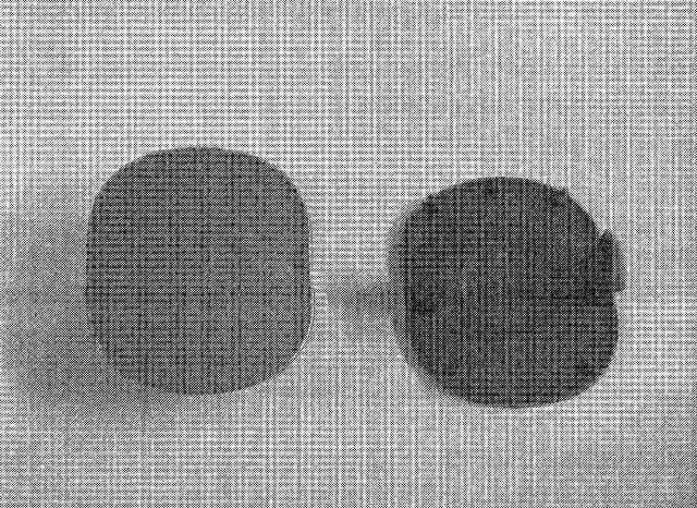 PLASTIC CAPS . THE PART IS IMPORTED FOR THE INDUSTRIAL ASSEMBLY OF MOTOR VEHICLES OF TARIFF HEADING 8703. The part comprises a moulded plastic cap, with two plastic protrusions to the rear which are used to affix the cap to the dashboard of the vehicle. The dashboards ot the manufactured vehicles are designed with a number of spaces to accomodate the incorporation of control dials, buttons and other accessories of the vehicle interior, e.g., a cigarette lighter. The dashboard cap is specially designed to affix in these spaces where the particular button or accessory is not present in a vehicle. The part is therefore specially moulded to fit the dashboard of specific vehicle models.