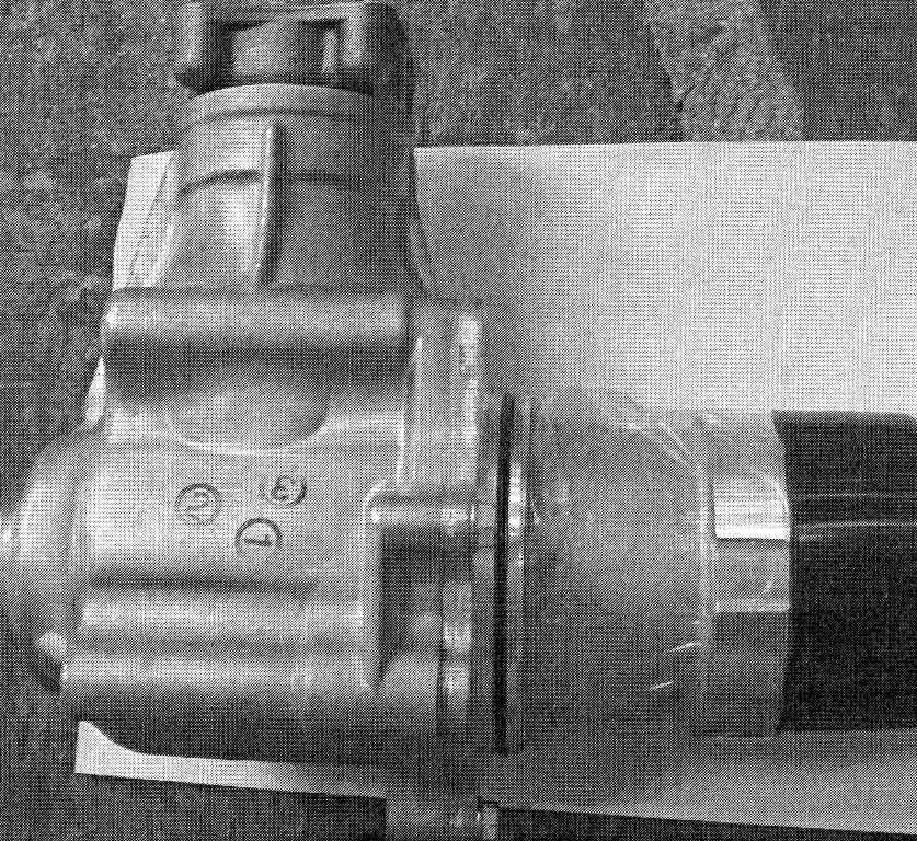 TRANSFER ASSEMBLY. THE PART IS A TRANSFER ASSEMBLY WHICH TRANSFERS DRIVE TORQUE FROM THE ENGINE TO THE PROP SHAFT IN FOUR WHEEL DRIVE VEHICLES. THE PART CONNECTS THE ENGINE TO THE PROP SHAFT. THE CONNECTION UNDER THE BLACK COVER ATTACHES TO THE ENGINE, THE OTHER FITTINGS ATTACHES TO PROP SHAFT. THE ITEM CONTAINS GAERINGS TO FACILITATE THE TORQUE TRANSFER. THE PART IS MANUFACTURED FROM CAST STEEL. THE PART IS SPECIFICALLY DESIGNED TO BE USED IN THE INDUSTRIAL ASSEMBLY OF VEHICLES OF TARIFF HEADING 8703 AND IN PARTICULAR THE MANUFACTURE OF FOUR WHEEL DRIVE VEHICLES. IT CANNOT BE USED IN ANY OTHER APPLICATION OF A MORE GENERAL USE.