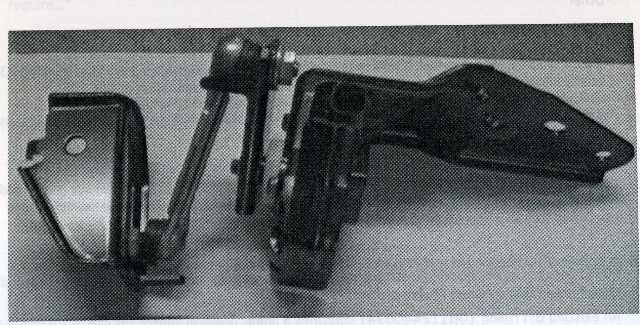 SENSOR ASSEMBLY  FRONT HEADLAMP. THE PART IS IMPORTED FOR THE INDUSTRIAL ASSEMBLY OF MOTOR VEHICLES OF TARIFF HEADING 8703. THE PART IS MADE OF STEEL AND PLASTIC. THE PART COMPRISES TWO STEEL MOUNTING BRACKETS LINKED BY AN ARTICULATED ARM, DESIGNED TO ATTACH THE HEADLAMP TO THE VEHICLE BODY. THE PART IS LOCATED BEHIND THE FRONT HEADLAMPS. THE PART COMPRISES ELECTRICAL CONNECTIONS TO CONNECT THE HEADLAMPS TO THE ELECTRICITY SOURCE. THE PART IS DESIGNED TO ADJUST THE ANGLE OF THE FRONT HEADLAMPS OF THE VEHICLE IN ORDER TO CONTROL THE DIRECTION OF THE HEADLAMP BEAM. THSES ADJUSTMENTS ARE MADE ON THE BASIS OF THE INFORMATION RECEIVED FROM  APOSITION SENSOR WHICH DETECTS THE POSITION OF THE VEHICLE HEADLAMP. NEITHER THE POSITION SENSOR NOR THE HYDRAULICS WHICH DRIVE THE MOVEMENT OF THE HEADLAMP ARE INCORPORATED INTO THE SENSOR ASSEMBLY IN ITS IMPORTED STATE.