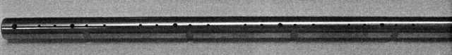 SHAFT COMPONENT ROCKER. THE PART IS IMPORTED FOR THE INDUSTRIAL ASSEMBLY OF MOTOR VEHICLES OF TARIFF HEADING 8703. THE PART IS THE SHAFT ON WHICH THE ROCKER ARMS OIVOT, SITTING INSIDE THE ENGINE ABOVE THE ENGINE CYLINDERS. THE PART COMPRISES A HOLLOW STEEL TUBE OF EXTERIOR DIAMETER 16MM AND INTERNAL DIAMETER 10MM. THE PART PERFORMS TWO FUNCTIONS WITHIN THE ENGINE. THE PRINCIPAL FUNCTION OF THE ROCKER SHAFT IS TO ACT AS A PIVOT FOR THE ROCKER ARMS, WHICH OPERATE THE INLET AND EXHAUST VALES TO THE ENGINE CYLINDERS. THE PART ALSO DISTRIBUTES LUBRICATING OIL TO THE ROCKER ARMS AND ENGINE VALVES. TO THIS END THE SHAFT IS MACHINED WITH SMALL HOLES AT CERTAIN POINTS ALONG ITS LENGTH. THESE HOLES ALLOW FOR THE FLOW OF OIL TO THE MOVING PARTS OF THE ENGINE. THE PART IS DESIGNED FORUSE IN A SPART IGNITION INTERNAL COMBUSTION ENGINE OF A KIND CLASSIFIED TO TARIFF HEADING 8407