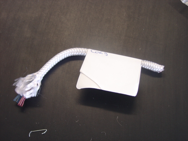 6MM BRAIDED POLYPROPYLENE PULLEY CORD. WITH A CENTRE CORE OF VARIOUS COLOURED STRIPS OF SYNTHETIC PLASTIC. DECITEX 149,000.
