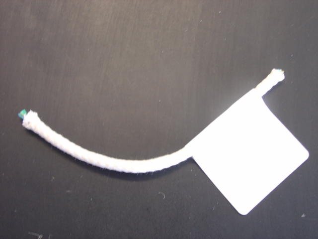 5MM WAXED COTTON PLAITED PULLEY CORD. WITH A CENTRE CORE OF VARIOUS COLOURED FOLDED STRIPS OF SYNTHETIC PLASTIC.  DECITEX 150,000