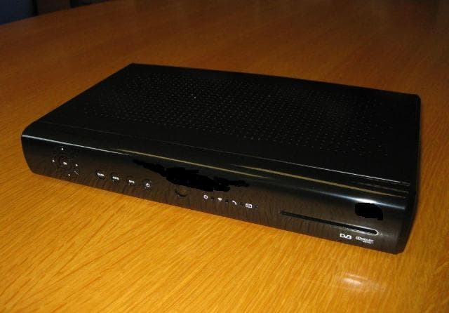 SET TOP BOX WITH COMMUNICATION FUNCTION, NO HARD DRIVE.THE PRODUCT IS MICROPROCESSOR BASED AND INCLUDES A VIDEO TUNER FOR TELEVISION RECEPTION AND INCORPORATES A MODEM FOR INTERACTIVE INFORMATION EXCHANGE  AND IS FITTED WITH AN RJ11 SOCKET. THE INTERNAL SOFTWARE IS CAPABLE OF CREATING HYPERTEXT TRANSFER PROTOCOL GET AND POST REQUESTS FOR ANY UNIFORM RESOURCE LOCATOR ( THIS IS THE INTERNET ADDRESS FOR ANY PAGE OR INFORMATION ON THE INTERNET).