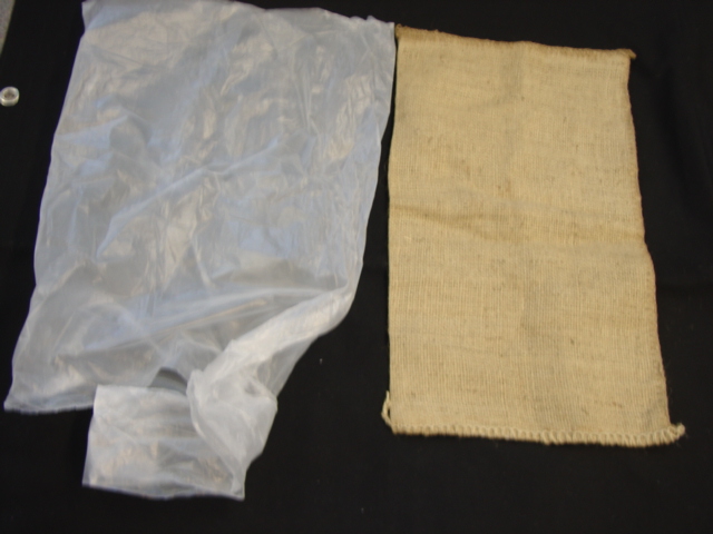 A SELF-INFLATING FLOOD DEFENCE SANDBAG WITH A  JUTE OUTER BAG AND  A NON-HAZARDOUS SUPER ABSORBENT POLYMER(SAP) FILLING. THE SAP IS AN ACRYLIC POLYMER THAT EXPANDS WHEN IN CONTACT WITH WATER. EACH BAG WEIGHS APPROX 410g DRY 16KG WET
