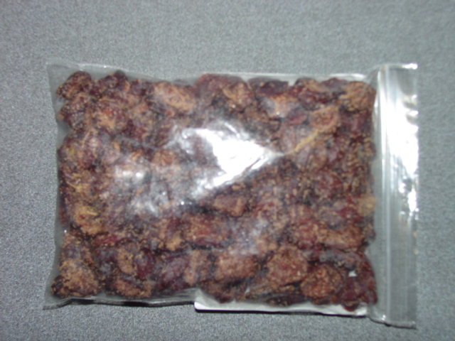 DRIED SWEETENED CRANBERRIES WITH CINNANMON COATING. INGREDIENTS SUGAR 59.8 PERECNT CRANBERRIES  32.2 PERCENT DEXTROSE 6.8 PERCENT CINNANMON 1.2 PERCENT. PACKAGED IN 11.3KG CARTONS.