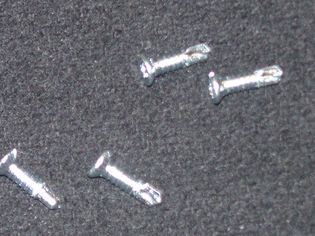 CARBON STEEL CROSS HEAD SELF DRILLING SCREW, SHANK MEASURES 4 MM BY 14 MM.