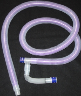 A COMBI-FLEX TUBING KIT THAT CONSISTS OF A LENGHT OF CORRUGATED FLEXIBLE PLASTIC TUBING 197CM LONG WHICH HAS A COLOURED INNER TUBING AND TWO END PIECES. IT ALSO HAS A SMALL TUBE ATTACHMENT AT ONE END. THE TUBE IS MADE OF TWO POLYMERS, HIGH DENSITY POLYETHYLENE AND ETHYLENE VINYL ACETATE COPLYMER. THE TUBING HAS A BURST PRESSURE IN EXCESS OF 27.6 MPA.