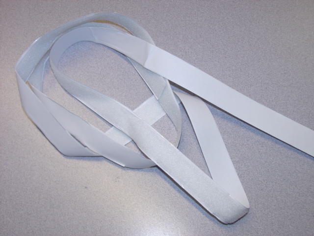 SELF ADHESIVE VELCRO TYPE TAPE OF NYLON. WIDTH APPROXIMATELY 20MM