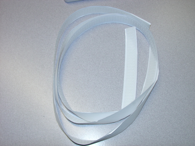 SELF ADHESIVE VELCRO TYPE TAPE OF NYLON. WIDTH APPROXIMATELY 20MM