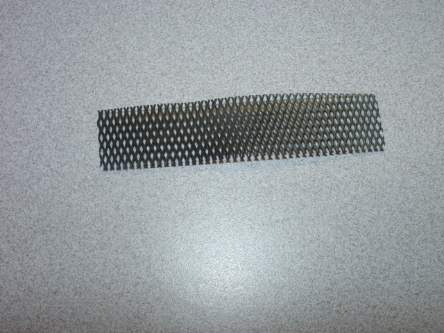 TITANIUM ANODE RIBBON MESH. COATED WITH A MIXED METAL OXIDE. USED TO PREVENT RUST/PROVIDE PROTECTION OF REINFORCED CONCRETE STRUCTURES.