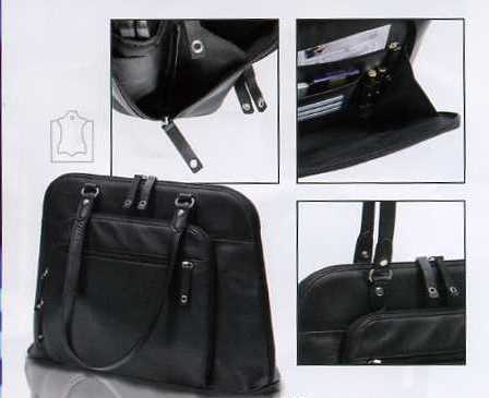 A LADIES BLACK EXECUTIVE LAPTOP CASE. WITH CENTRE ZIPPED COMPARTMENT TO HOLD A LAPTOP. ONE OUTER ZIPPED POCKET DESIGNED TO HOLD ITEMS SUCH AS PENS, CARDS, DOCUMENTS AND PAPERS. WITH TWO CARRY HANDLES. MADE OF LEATHER. DIMENSIONS SIZE 31CM X 43CM X 16CM.