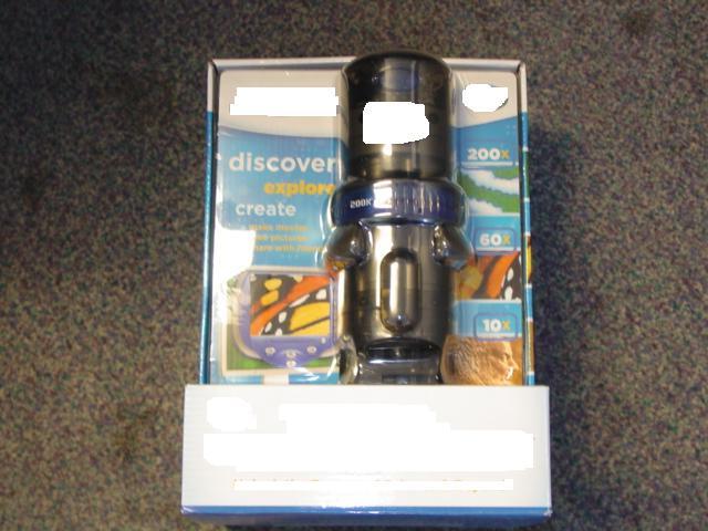 A COMPUTER MICROSCOPE THAT OPTICALLY MAGNIFIES OBJECTS BY 10X, 60X OR 200X.  IT CAN ONLY BE USED WITH A PC VIA A USB PORT. SOFTWARE ENABLES THE MAGNIFIED OBJECT TO BE VIEWED ON A COMPUTER AND FROM THIS TO TAKE PICTURES, CREATE SLIDESHOWS, VIDEOS AND STICKERS. IT IS DESIGNED FOR USE BY CHILDREN OVER 6 YEARS OLD. THE MICROSCOPE IS PRESENTED WITH A USB CABLE, COMPUTER SOFTWARE CD AND A LAB KIT CONSISTING OF EYEDROPPER, SLIDE CLIP, SAMPLE SLIDE, PLASTIC TWEEZERS, SPECIMEN JARS AND CONTAINMENT DISHES.    THE ITEMS ARE PACKAGED TOGETHER FOR RETAIL SALE IN A PLASTIC BOX WITHIN A PAPERBOARD SLEEVE.