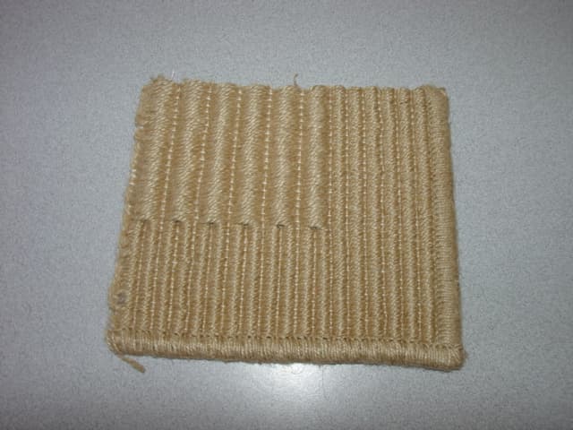 WOVEN DOOR MAT. OF JUTE.