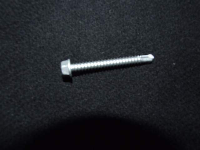 A SELF-DRILLING CROSS-RECESSED SCREW WITH A BIFURCATED POINT MADE OF STEEL . DESIGNED FOR ATTACHING WOOD TO STEEL. THE SCREW HAS TWO WINGS TO DRILL A CLEARANCE HOLE THROUGH WOOD. THE SCREW WILL THEN SCREW DIRECTLY INTO THE STEEL ATTACHING THE WOOD.  PACKAGED FOR RETAIL SALE IN BOXES OF A HUNDRED. DIAMETER EXCEEDS 6MM AND SHANK THICKNESS LESS THAN 6MM