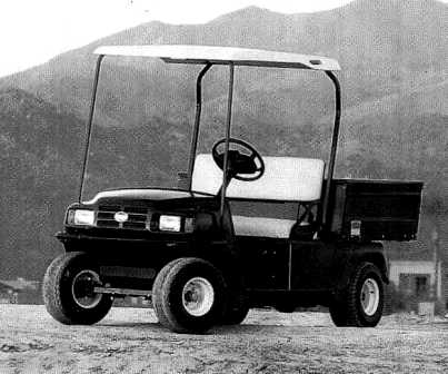 ELECTRIC WORKS TRUCK WITH FOUR WHEELS.  SUITABLE FOR TRANSPORT OF LIGHT GOODS OVER SHORT DISTANCES.  THE VEHICLE HAS NO CAB OR ROOF, AND HAS A BENCH STYLE SEAT FOR TWO.  THE GOODS SECTION IS OPEN AT THE REAR OF THE VEHICLE.  POWER SOURCE: 36 V DC ELECTRICAL MOTOR.  POWER: 1.9 KW AT 2700 RPM.