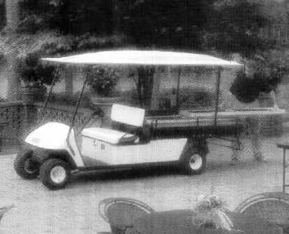 PETROL DRIVEN VEHICLE FOR TRANSPORTING CARGO.  FRAME: WELDED STEEL WITH POWDER COAT FINISH.  FRONT BODY AND FINISH: INJECTION MOULDED TPO.  REAR BODY AND FINISH: STEEL, BASE COAT / CLEAR COAT.  STANDARD COLOUR: CHAMPAGNE.  POWER SOURCE: 401 CC PETROL ENGINE.  HORSEPOWER: 13 HP.  SEATING CAPACITY: 2 PERSONS.  DRY WEIGHT (WITHOUT BATTERIES): 381 KG.  OVERALL LENGTH: 3505 MM.  OVERALL WIDTH: 1181 MM.  OVERALL HEIGHT: 1880 MM (WITH CANOPY), 1234 MM (TO TOP OF STEERING WHEEL).  WHEEL BASE: 2375 MM.