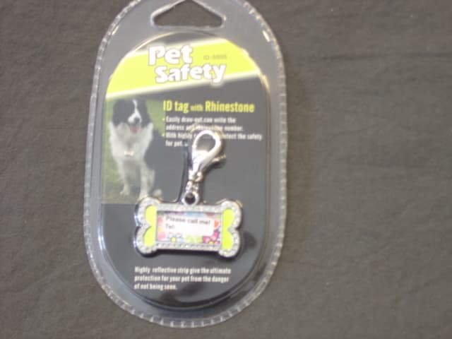 SAFETY TAG FOR PETS. WITH RHINESTONE METAL (ZINC ALLOY). WTH REFLECTIVE STRIP. WITH CLIP. SINGLE PACKED ON CARD AND SEALED IN PLASTIC.