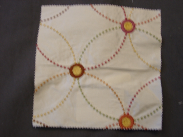 A WOVEN FABRIC WITH EMBROIDERED FLORAL DESIGN. OF 67 PERCENT SILK AND 33 PERCENT VISCOSE. WITH VISIBLE BACKGROUND OF 100 PERCENT SILK. OF A VALUE EXCEEDING 17.50 EURO PER KG. WIDTH 134 CMS.
