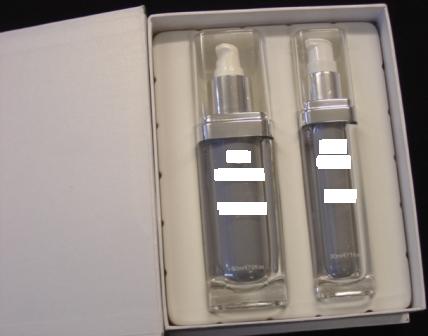 A 60ML ACRYLIC PUMP ACTION  BOTLE OF ANTI-AGING 24K GOLD AFTERSHAVE BALM, PACKAGED WITH A 30ML BOTTLE OF 24K GOLD FACIAL SERUM. BOTH DESIGNED FOR MEN. THE AFTERSHAVE BALM INGREDIENTS INCLUDE WATER (AQUA) , ISOPROPYL PALMITATE, PROPYLENE GLYCOL, STEARIC ACID, 24K GOLD, ALLANTOIN AND FRAGRANCE. COMES PACKAGED IN A DECORATIVE CARDBOARD BOX.
