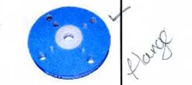 PIPE FITTING. CAST FITTING.  MADE FROM STEEL. LINED WITH PFA (PLASTIC). REDUCING FLANGE. DESIGNED FOR USE IN CHANGING DIAMETERS IN A PIPING SYSTEM.CONSISTS OF A FLANGE WITH ONE SPECIFIED DIAMETER HAVING A BORE OF A DIFFERENT AND SMALLER DIAMTER. WITH WAFER STYLE REDUCER PLATES WITH THREADED BOLT HOLES AND CONCENTRIC BORES.