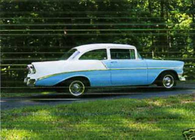 1956 CHEVROLET 210  2 DOOR SEDAN. SPARK IGNITION INTERNAL COMBUSTION RECIPROCATING PISTON ENGINE (PETROL) HAVING A CYLINDER CAPACITY OF 5.7 LITRES. VIN NO B56F165091. USED.THE CAR HAS TEAL AND WHITE PAINTWORK WITH CHROME AND GLASS INTERIOR.. THE ENGINE HAS BEEN CHANGED FROM A STRAIGHT 6 TO A V8 WITH AUTOMATIC TRANSMISSION.