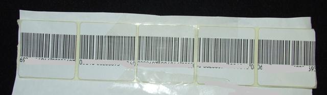 SELF ADHESIVE RADIO FREQUENCY LABEL.THE LABEL IS A THIN PLASTIC SHAPE WITH A PRINTED  CIRCUIT COIL EMBEDDED IN IT.IT IS TUNED TO A PARTICULAR FREQUENCY WHICH ACTIVATES AN ALARM IF IT PASSES A DETECTOR SITED AT THE STORE EXIT. IT CAN BE DEACTIVATED AT THE SALES COUNTER.THE LABELS ARE PRESENTED IN ROLLS.DIMENSIONS FOR THE LABEL ARE 40MM BY 40MM