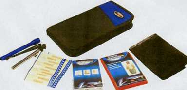 A NON WOVEN TEXTILE EMERGENCY BLANKET. OF POLYESTER (PET). PRESENTED FOR RETAIL SALE AS PART OF A GLOVE BOX EMERGENCY KIT. PACKAGED IN A POLYESTER CARRY CASE WITH A RAIN PONCHO, 1 FLASH LIGHT, 1 TYRE GAUGE, 10 STICKING PLASTERS AND 1 MESH DRAWSTRING TOTE BAG,  ALL CLASSIFIED SEPARATELY.