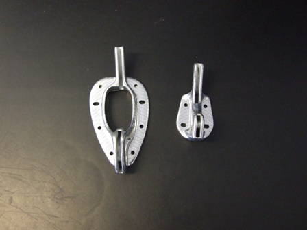 CARBON FIBRE FITTINGS FOR ICE SKATE BLADES. SOLE AND HEEL PLATE FITTINGS. WITH FIXING HOLES TO ATTACH TO A BOOT. DESIGNED TO HOLD A SKATING BLADE IN PLACE. TO BE USED FOR ICE SKATING. PACKAGED AS COMPLETE UNITS OF 20 CONSISTING OF 20 LEFT SOLE PLATES, 20 RIGHT SOLE PLATES AND 40 LEFT AND RIGHT HEEL PLATES IN A CARDBOARD BOX.