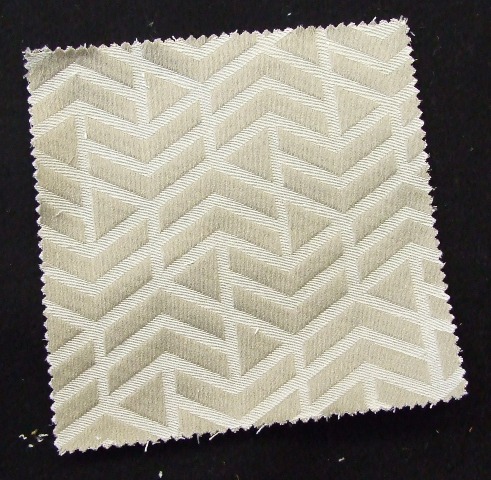 WOVEN FABRIC OF 52 PERCENT STAPLE FIBRE AND 48 PERCENT FILAMENT FIBRE. OF POLYESTER. CONSTRUCTED OF YARNS OF DIFFERENT COLOURS. WIDTH OF FABRIC 140 CMS.