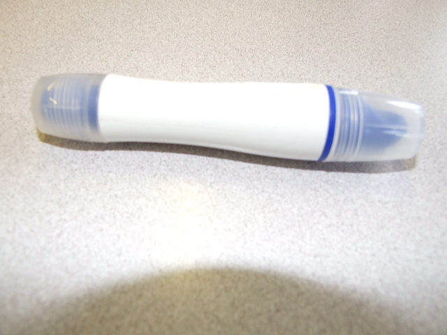 HARD SKIN TREATMENT ASSEMBLY. THE PRODUCT IS A DOUBLE ENDED PACK DESIGNED TO APPLY A FORMULATION THAT IS DISPENSED FROM A ROLLERBALL AT ONE END WITH THREE FIXED CIRCULAR METAL FILES AT THE OTHER. THE FORMULATION CONTAINS HYLAURONIC ACID TO SOFTEN THE SKIN. THE FILE HAS STAINLESS STEEL SAFE BLADES. PUT UP FOR RETAIL SALE IN A PLASTIC PACK.