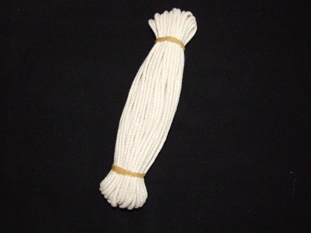 3.2MM TIGHTLY BRAIDED COTTON CORD. WITH CENTRE CORE. 5.5 GMS PER METRE. 55,000 DECITEX. PUT UP FOR RETAIL SALE, 13.7 METRE LENGTH IN A PLASTIC BAG WITH CARD HEADER.