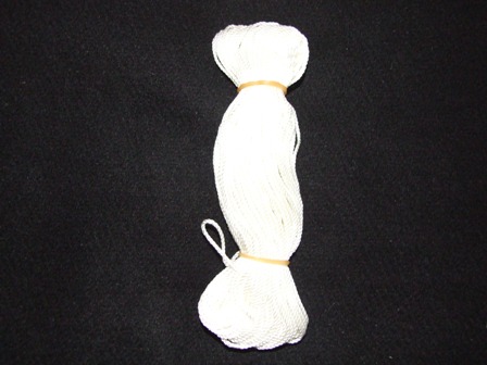 TWISTED NYLON YARN PUT UP FOR RETAIL SALE, 20 METRE LENGTH IN A PLASTIC BAG WITH CARD HEADER, WEIGHS 21 GRAMS. BRICKLAYERS LINE. 0.95 GMS PER METRE, 9,500 DECITEX.