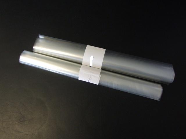 A LAMINATE SHEET MADE FROM POLYMERS OF PROPYLENE OF A THICKNESS NOT EXCEEDING 0.10 MM. DESIGNED AS A SEALING FOR POLYETHYLENE  NOT BIAXIALLY ORIENTED. 55 MICRONS IN TOTAL COMPRISING 43 MICRONS OF ORIENTATED POLYPROPYLENE AND 12 MICRONS OF POLYETHYLENE TEREPHTHALATE