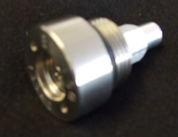 A STAINLESS STEEL VALVE. FOR USE WITH NON-REFILLABLE GAS CANNISTERS. APPROX OVERALL LENGTH 48 MM.