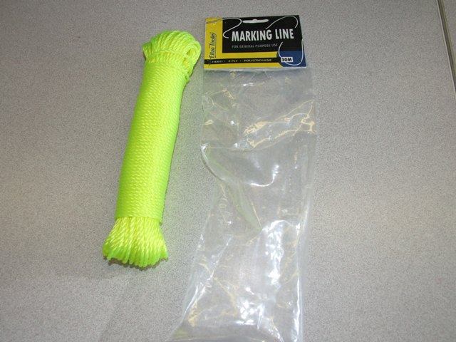 3 PLY POLYETHYLENE MARKING LINE. TWISTED. MEASURING 30 000 DECITEX (3 G/M). IN LENGTHS OF 30 METRES. YELLOW IN COLOUR. PUT UP FOR RETAIL SALE IN A PLASTIC BAG WITH CARDBOARD HEADER.