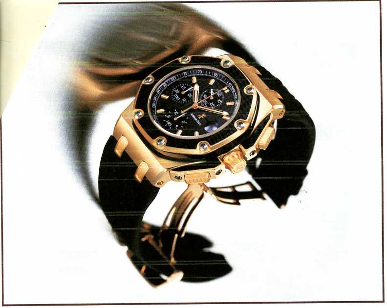 MENS CHRONOGRAPH WRIST WATCH WITH 
ROSE GOLD CASE, MECHANICAL SELF WINDING MOVEMENT AND BLACK STRAP