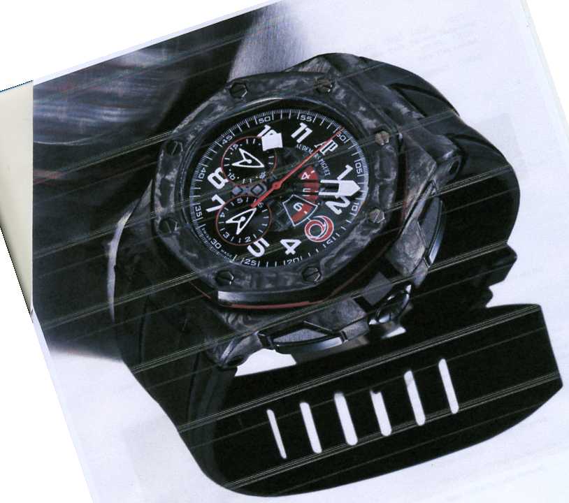 MENS CHRONOGRAPH WRIST WATCH WITH 
CARBON CASE, MECHANICAL SELF WINDING MOVEMENT AND BLACK STRAP