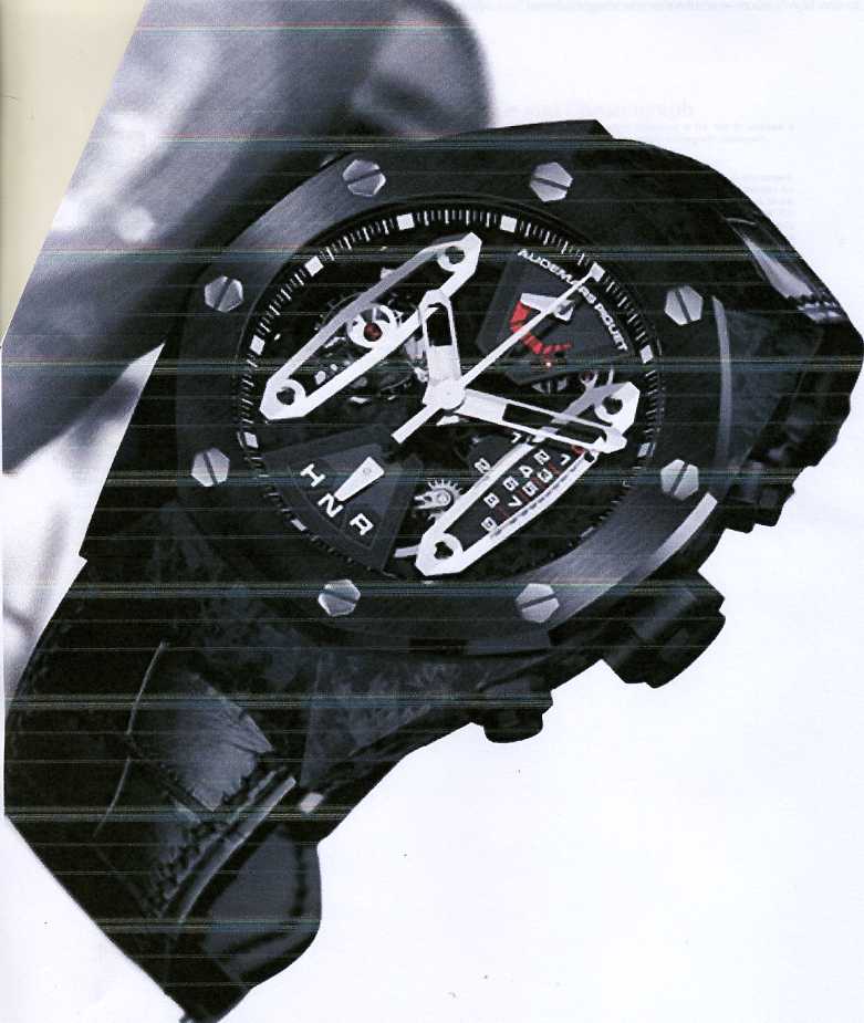 MENS CHRONOGRAPH WRIST WATCH WITH 
CARBON CASE, MANUALLY WOUND MOVEMENT AND BLACK STRAP