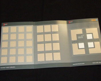 COMMERCIAL CATALOGUE OF PAPERBOARD. WITH PRINTED TEXT AND PHOTOGRAPHS.  THE CATALOGUE INCLUDES SAMPLES OF HIGH PRESSURED LAMINATE SWATCHES.