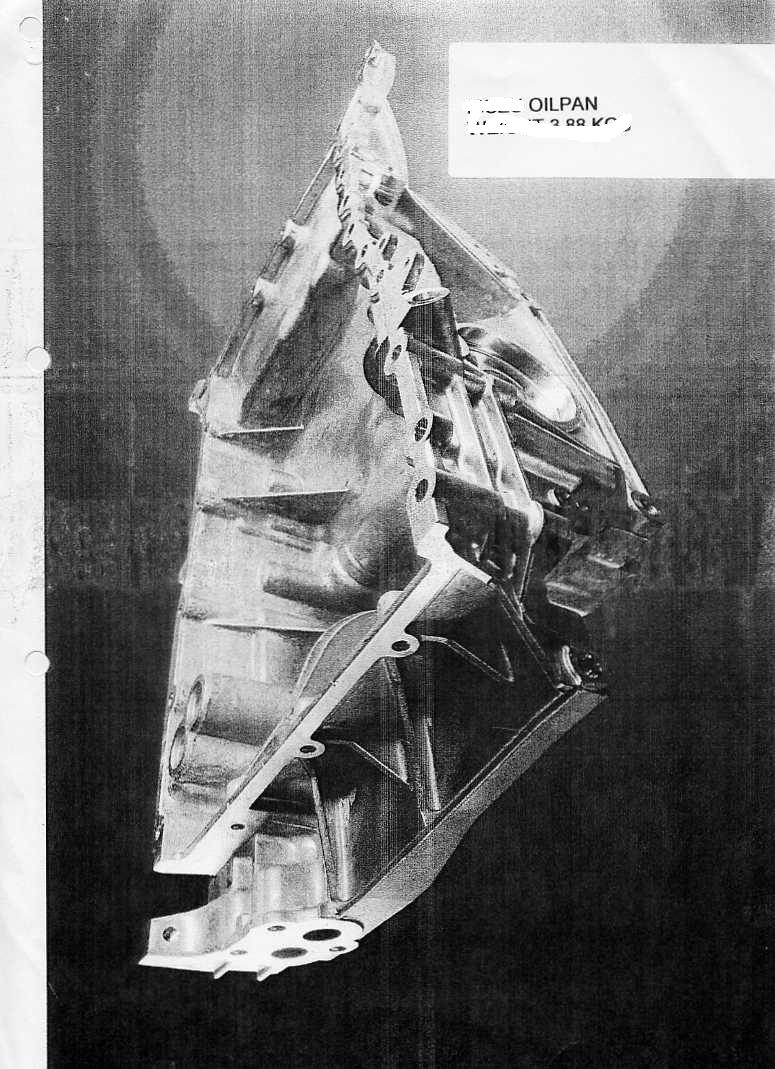 AN OIL PAN PART OF A DIESEL ENGINE. MADE OF HIGH PRESSURE ALUMINIUM DIE CASTING. THE PAN IS DESIGNED TO HOLD AND CONTAIN THE MOTOR OIL THAT CIRCULATES THROUGH THE ENGINE.  WEIGHT 3.88 KGS