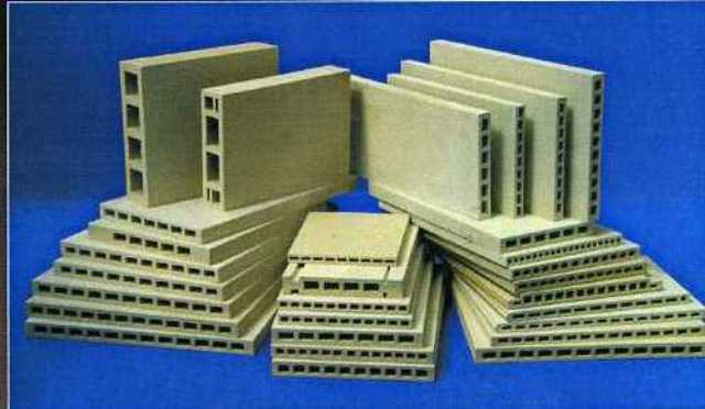 KILN CAR BUILD UPS. THESE PRODUCTS ARE  TILES USED FOR CLADDING THE METAL WORKS ON KILN CARS.THEY SERVE THE SAME PURPOSE AS THE REFRACTORY BRICKS USED FOR LINING THE KILN. THE TILES HAVE BEEN FIRED AFTER SHAPING AND THE COMBINED ALUMINA AND SILICA IN THE PRODUCT IS GREATER THAN 50 PERCENT.