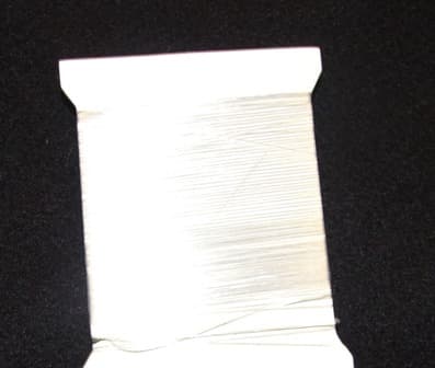 A SINGLE MULTIFILAMENT YARN OF POLYESTER.  45 DEN, 50 DTEX.  24 FILAMENT SEMI DULL.  SUPPLIED ON BOBBINS, NOT PUT UP FOR RETAIL SALE. NOT HIGH TENACITY.  NOT TEXTURED. WITHOUT TWIST. FULLY ORIENTATED.  USED TO CREATE WOVEN FABRIC WHICH IS USED IN THE AUTOMOTIVE INDUSTRY
