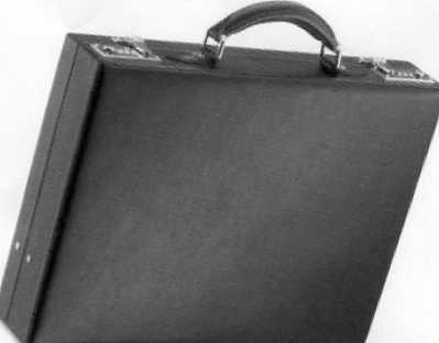 A COMPACT ATTACHE CASE MADE OF LEATHER WITH A PIGSKIN LINING. THE CASE HAS ONE POCKET AND TWO LOCKS. BLACK IN COLOUR. MEASUREMENTS ARE APPROX L400 X H300 X W80MM.